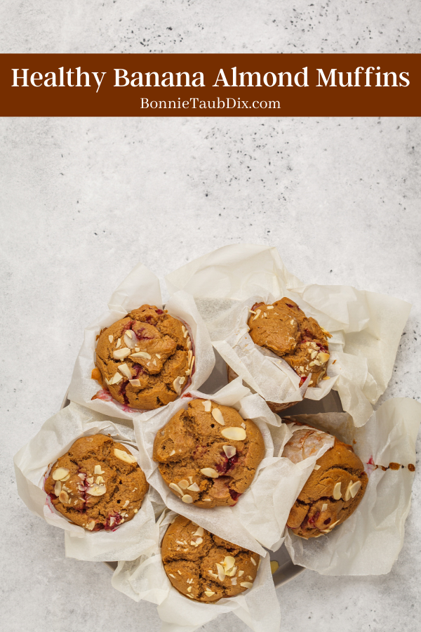 Healthy Banana Almond Muffins | Healthy, easy to make muffins filled with bananas and almonds. These muffins are high fiber, full of whole grain goodness, and low in sugar. A sweet snack the whole family will love!